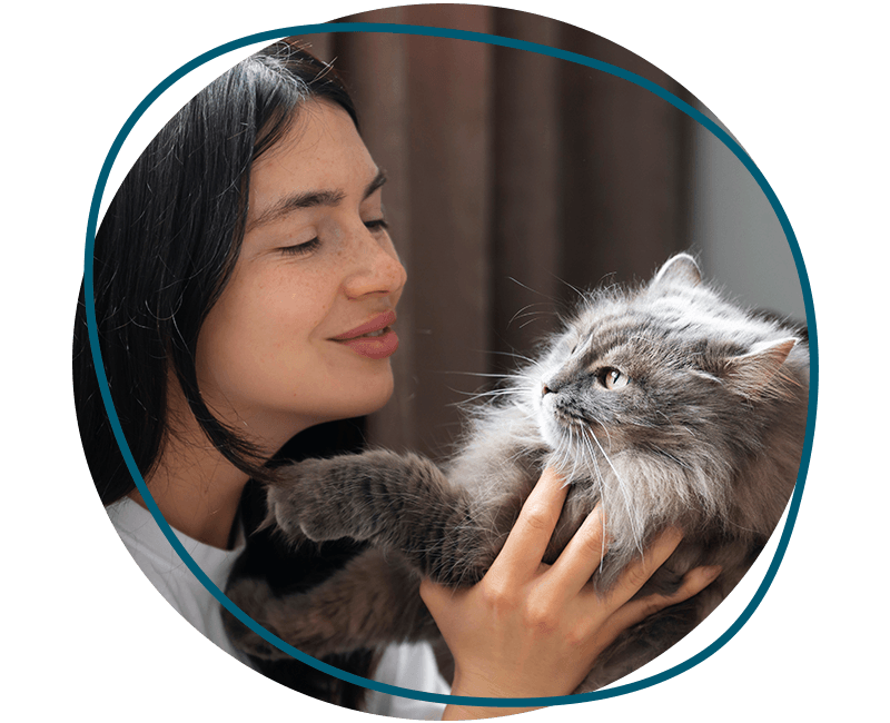 woman petting her cat